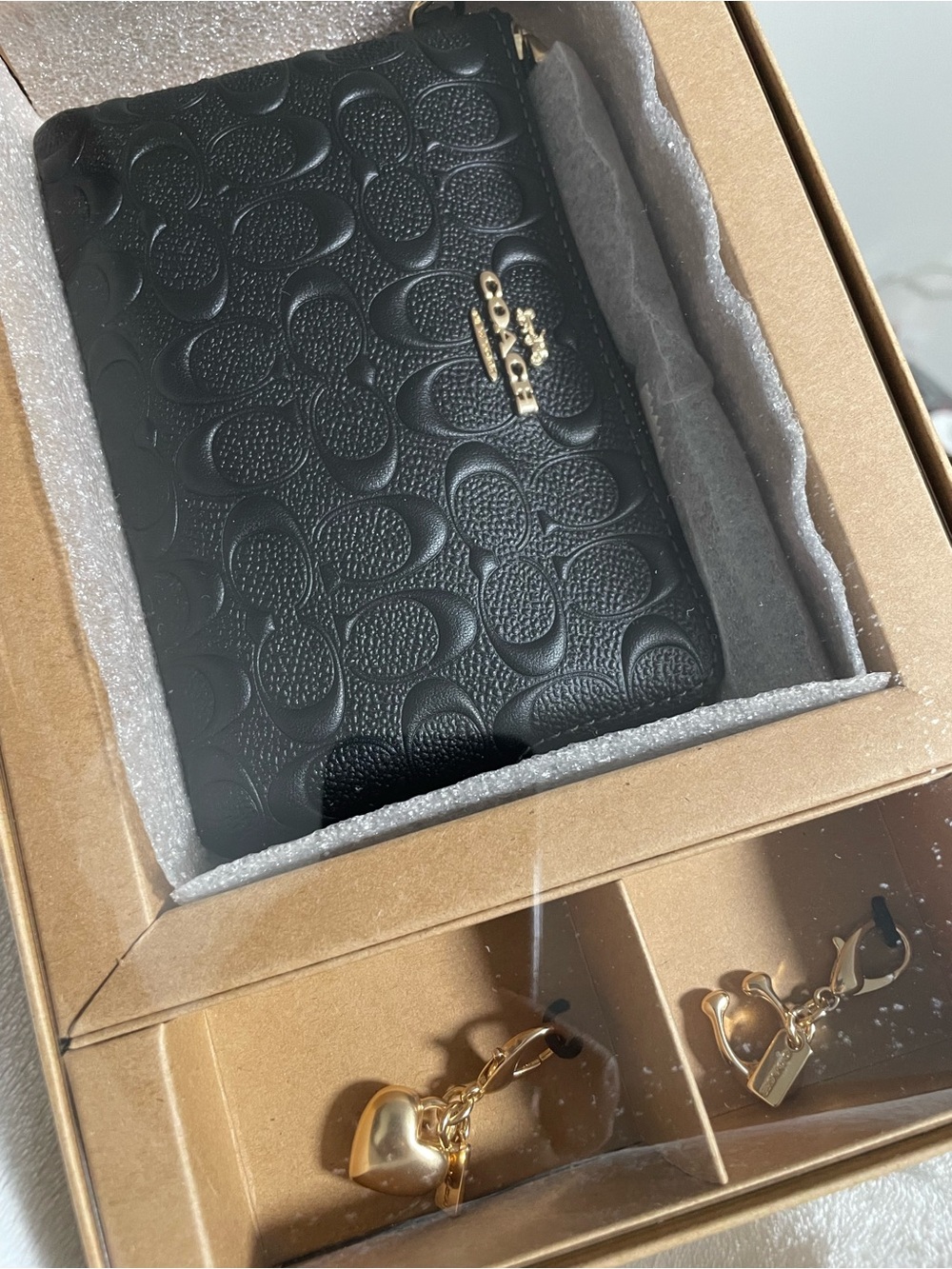 Coach wristlet / wallet with Gold Logo & charms